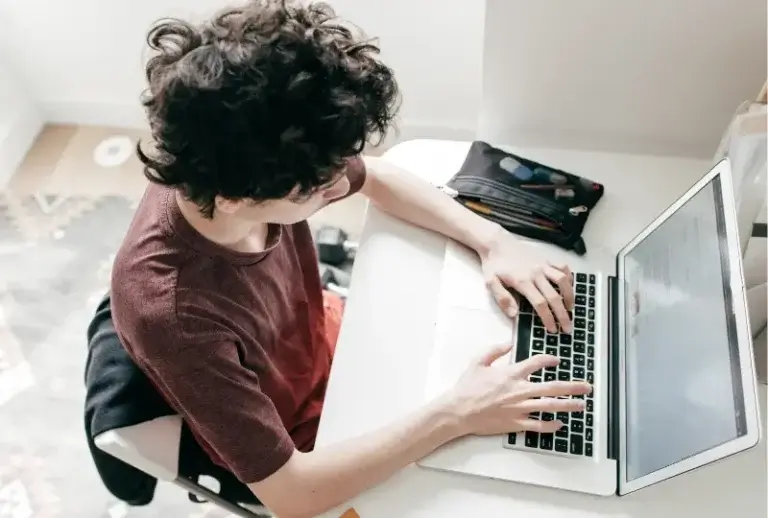 Man with laptop view from above